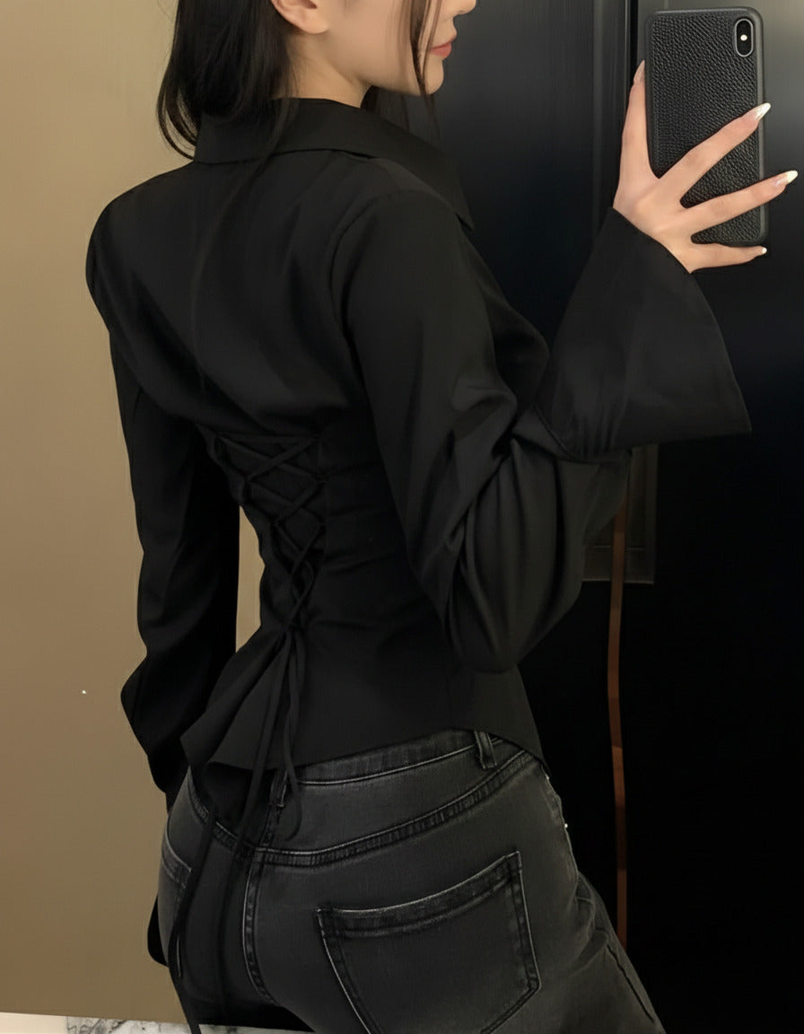 Black women's long sleeve blouse featuring back lace-up corset tie, flared bell cuffs, buttoned front, slim fit